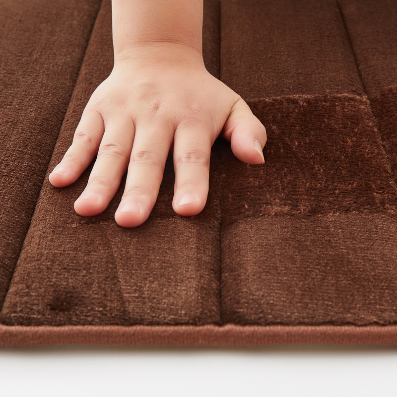 brown bath mat