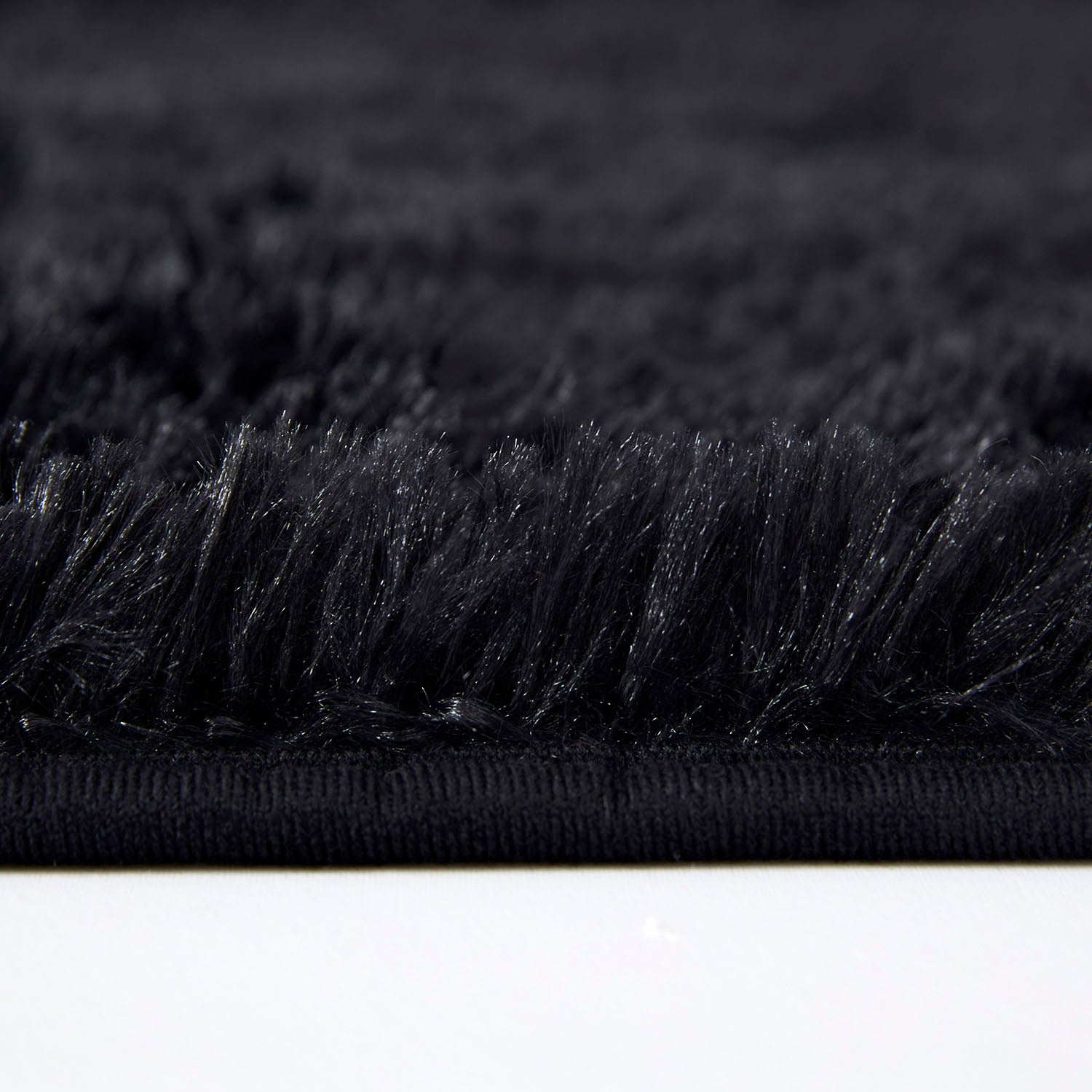 black sheepskin rug