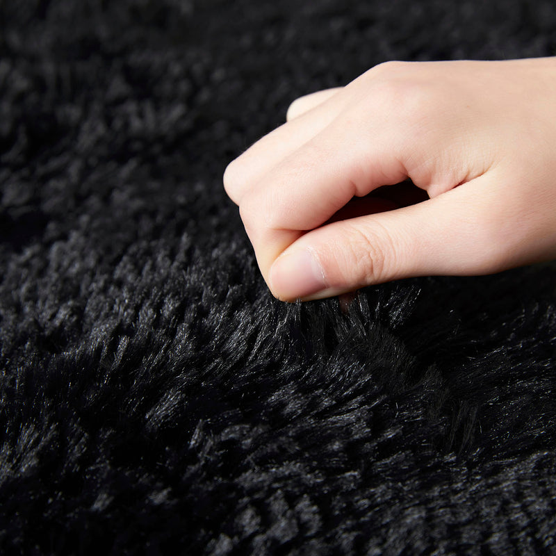 black sheepskin rug