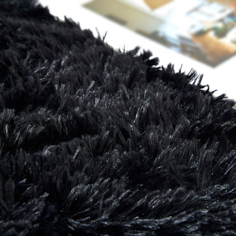 black sheepskin rug