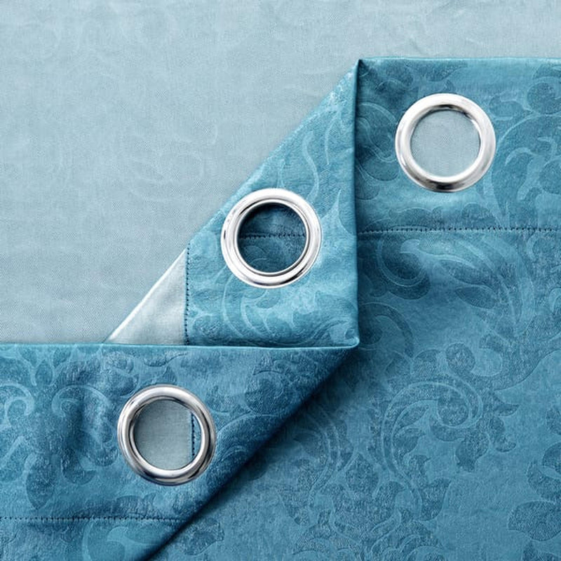embossed blackout ring curtain in teal